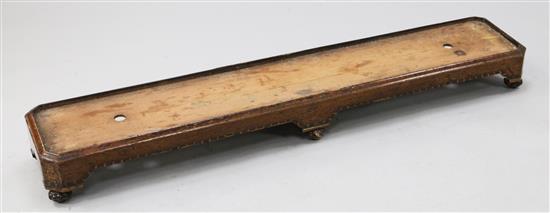 A late Victorian inlaid walnut fender stool, lacking seat, 4ft 4in.